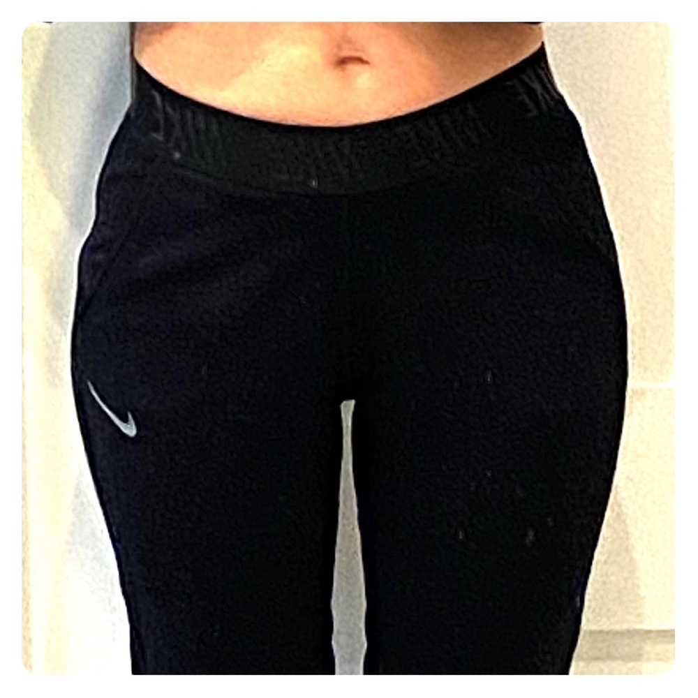 Nike cozy black capris with pockets
